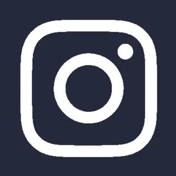 The image shows the instagram logo, which consists of a simple camera graphic represented by a white outline on a dark blue square background. the camera features a lens, viewfinder, and flash, stylized in a minimalistic design.